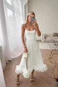 Women's Sleeveless Occasion Dress with Ruffle Hem and A-Line Silhouette - White