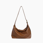 Women's Patent Vegan Leather Shoulder Bag with Curved Slouch - Camel