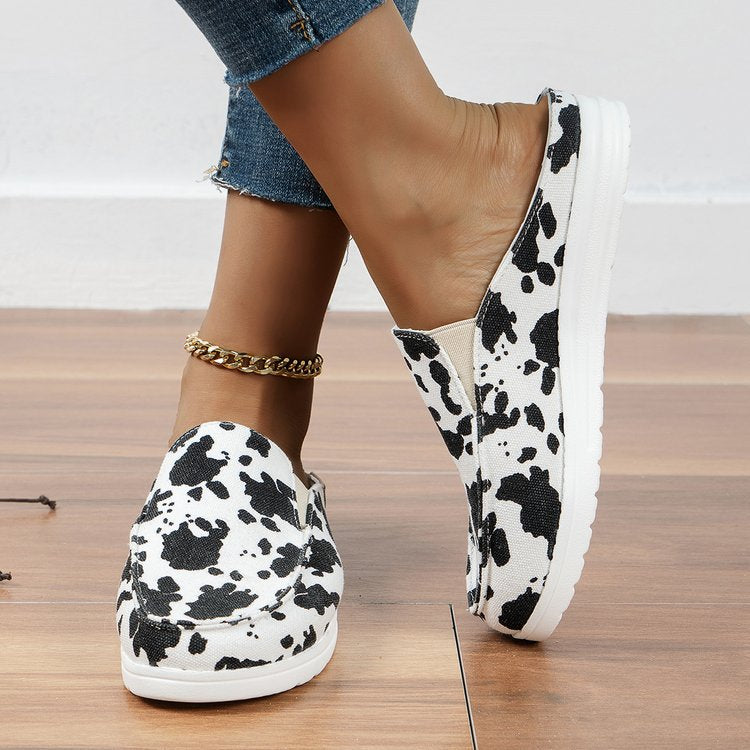 Women's Leopard Print Canvas Slip-On Mules with Cushioned Footbed - Cow Print