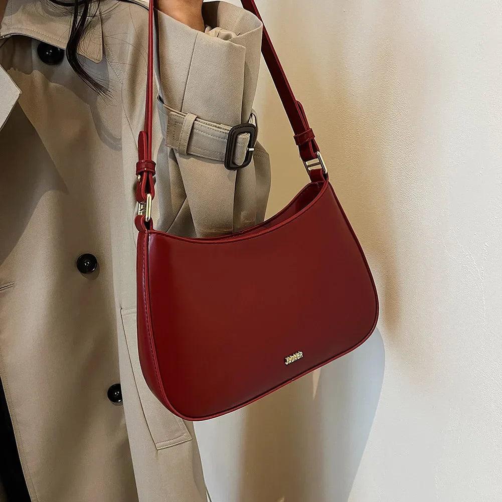 Women's Shoulder Bag with Adjustable Strap and Curved Silhouette