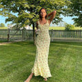 Women's Sleeveless Floral Maxi Dress with Scoop Neck and Flared Hem - Yellow